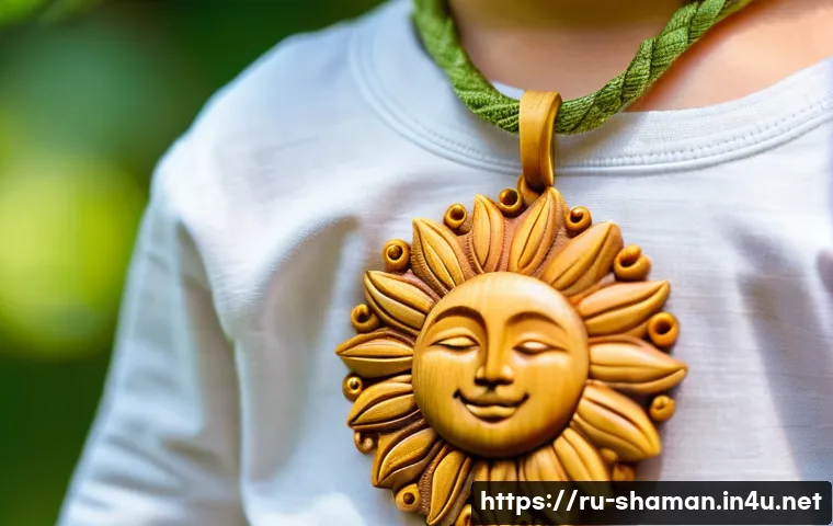 무속에서 아이를 위한 부적 - A close-up image of a child&rsquo;s wooden sun pendant amulet, intricately carved with floral patterns, ha...